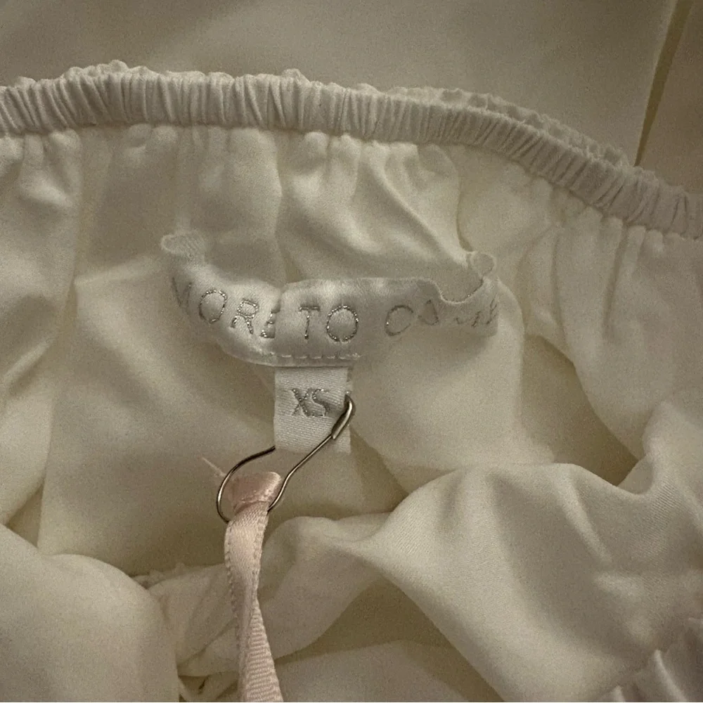 Revolve (More to come) White Strapless Mini Dress with Front Twist - Picture 6 of 6
